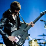 Matt Bellamy of Muse manipulates an XY MIDIpad installed on his guitar. Image courtesy of Flickr user moses_namkung. Licensed under Creative Commons.