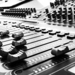 A picture of a mixing console.